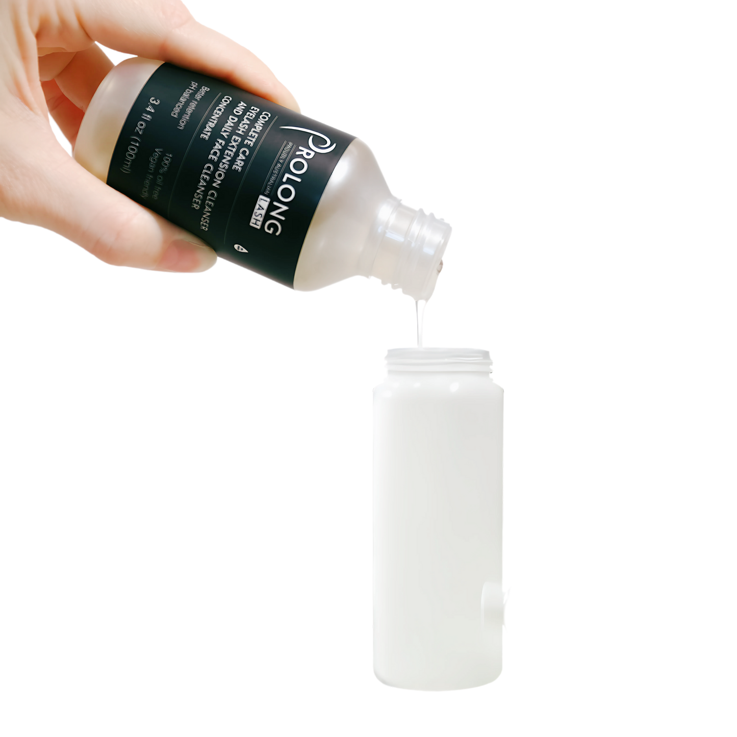 Hand pouring a white liquid from a Prolong bottle into a white container on a white background