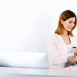 Girl working at a reception desk