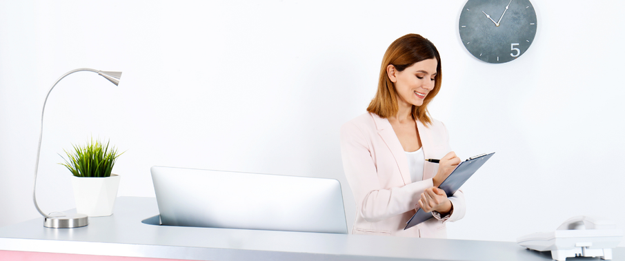 Girl working at a reception desk