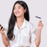 Women holding a phone and a credit card | Prolong Lash