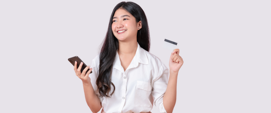 Women holding a phone and a credit card | Prolong Lash