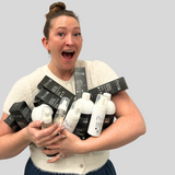 Woman holding cleansing products | Prolong Lash