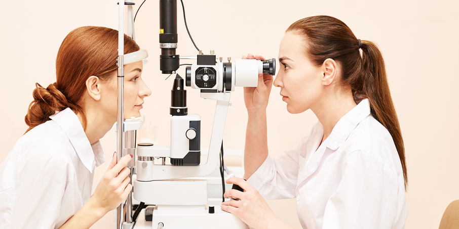 Ophthalmologist conducting an eye test 