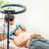 Client have an eyelash extension application in salon