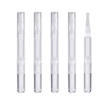 Set of five clear cosmetic applicators on a white background